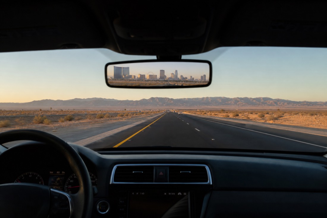 A car heading south on Las Vegas Boulevard in the early morning